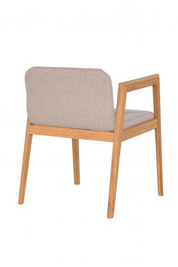 Židle s područkami ID s béžovým polstrováním je nejen ohromující doplňkem interiéru, ale také prémiovým řešením pro každodenní pohodlí.