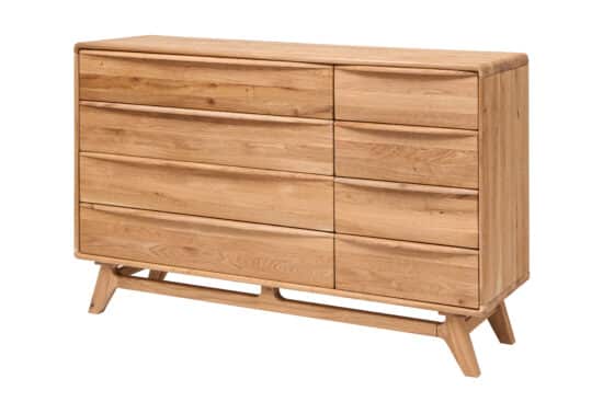 Dubová masivní komoda Bara 8Z vám nabídne osm prostorných zásuvek pro dokonalý pořádek ve vašem interiéru. Elegantní design a masivní provedení zajistí, že se stane stylovým a praktickým doplňkem každé domácnosti.“