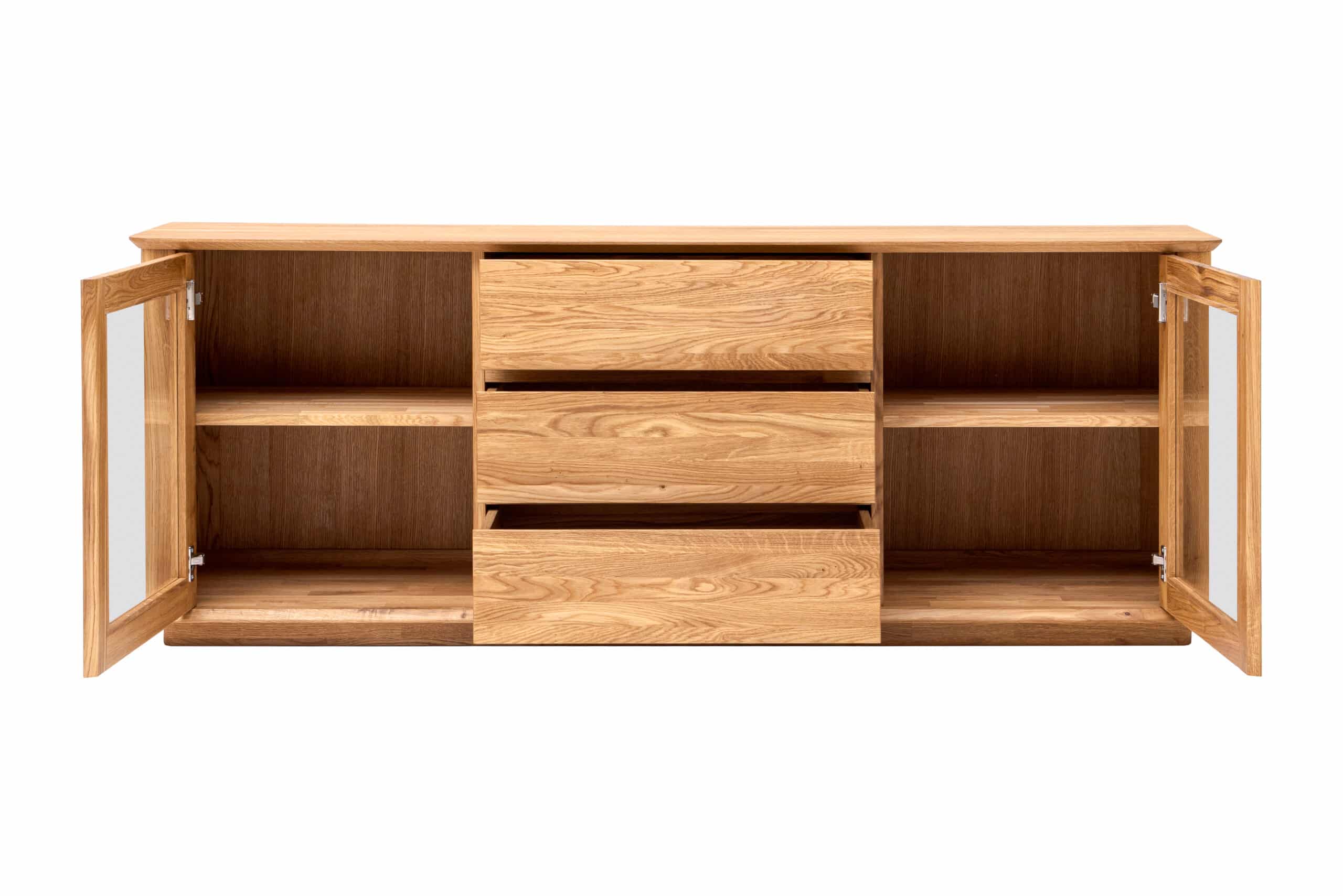 Skříňka pod TV Celin z masivního dubového dřeva kombinuje nadčasový design s praktickým úložným prostorem. Prosklené skříňky s nastavitelnými policemi a zásuvky se soft close dělají z tohoto kusu ideální centrum vašeho obývacího pokoje.