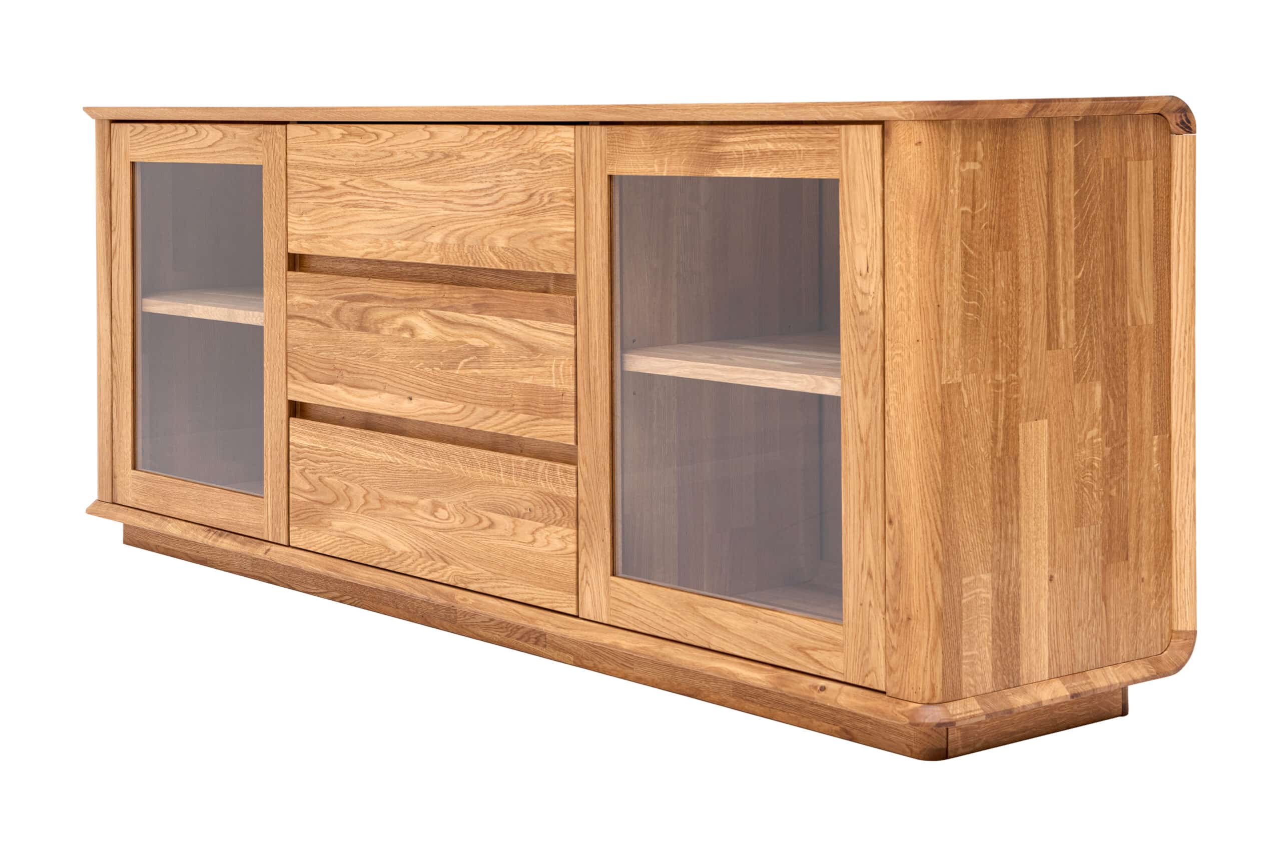 Skříňka pod TV Celin z masivního dubového dřeva kombinuje nadčasový design s praktickým úložným prostorem. Prosklené skříňky s nastavitelnými policemi a zásuvky se soft close dělají z tohoto kusu ideální centrum vašeho obývacího pokoje.